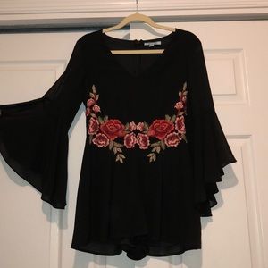 Black romper with rose design